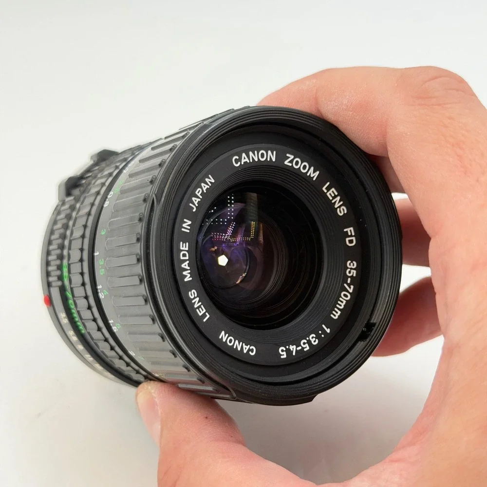 Canon Zoom Lens FD 35-70mm 1:3.5-4.5 Macro Film Camera Lens W/ Tiffen UV Filter